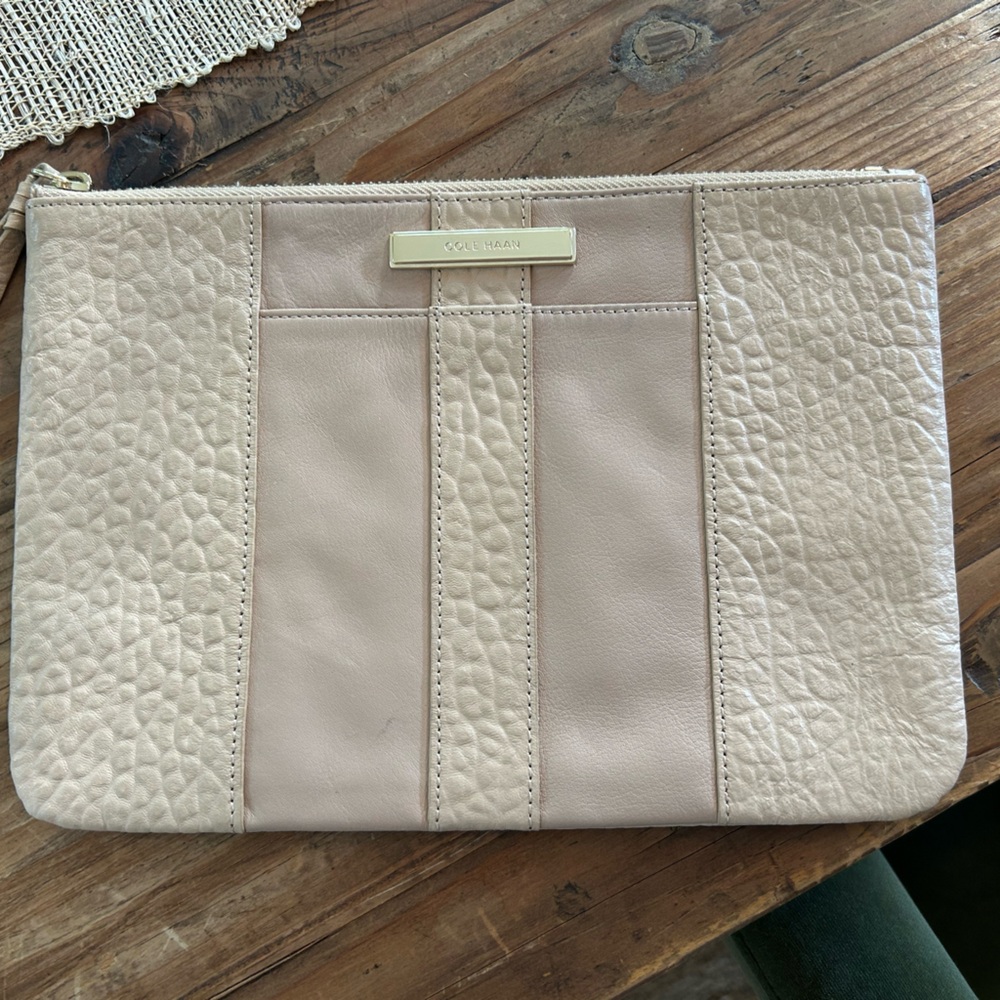 Never used Cole Haan clutch purse in perfect condition.